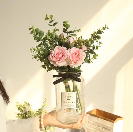 Artificial rose flowers with leaves and christmas berry bouquet flower arrangement